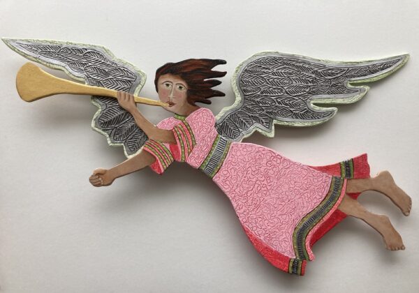 Red and pink wood flying angel on a pole with a base. Decorative sculpture. This angel is flying from right to left.