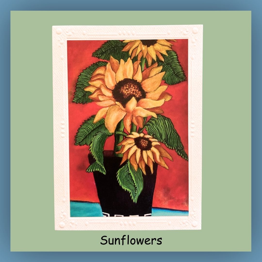 Greeting card showing Sunflowers in a black vase. background is orange. Inside of card is blank.