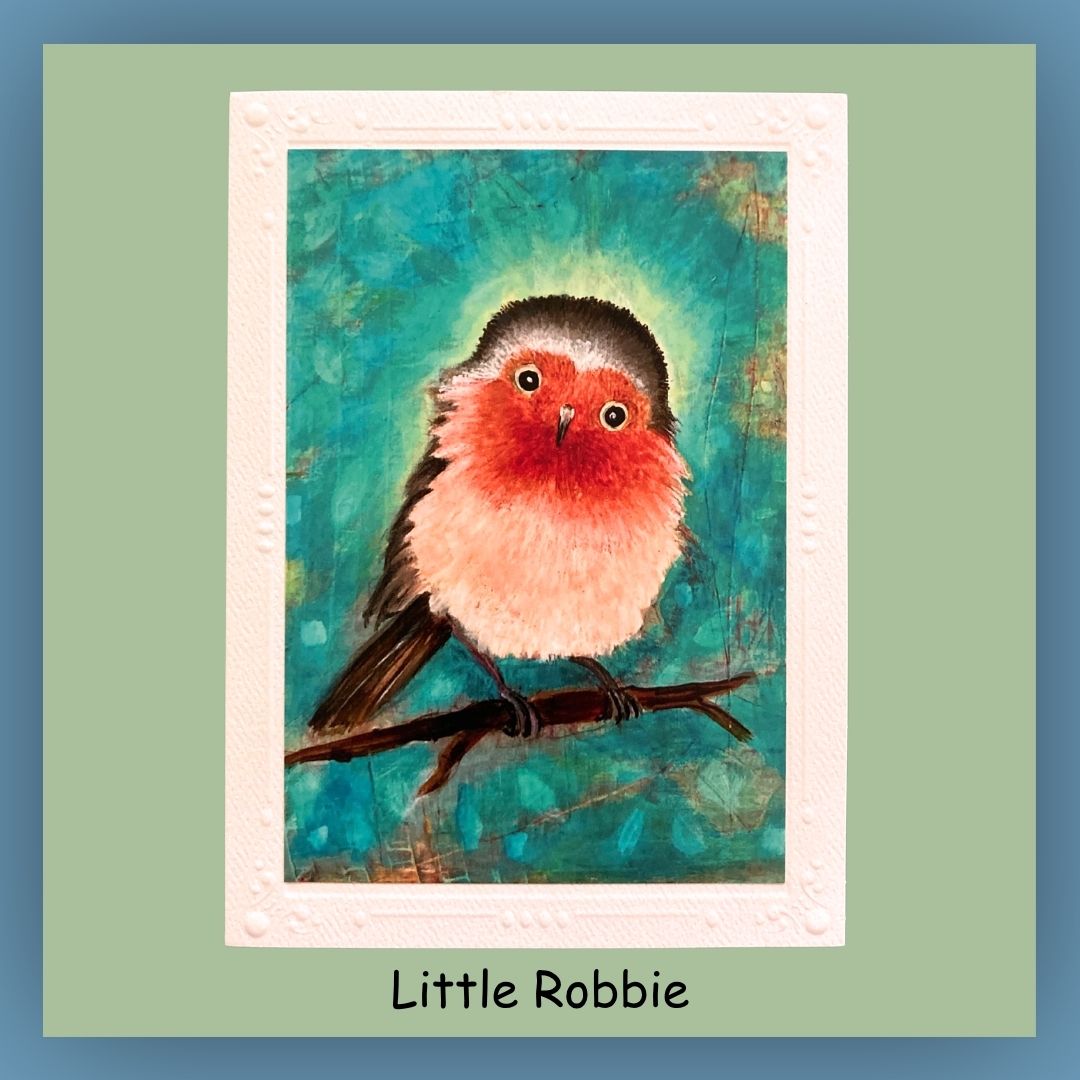 Greeting card with a little robin sitting on a limb on the front of the card. Blank inside